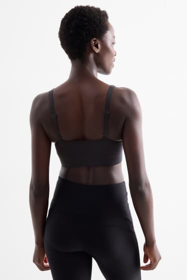 Femmes - Soutien-gorge de sport - ampliforme - finition côtelée - sans coutures - noir