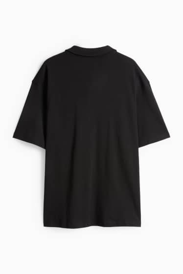 Uomo - Polo - relaxed fit - nero