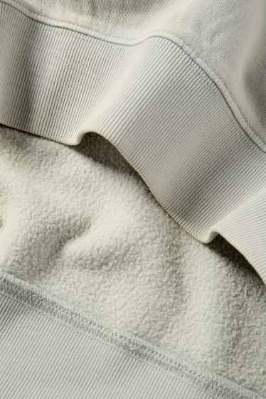 Home - Dessuadora oversized - gris clar