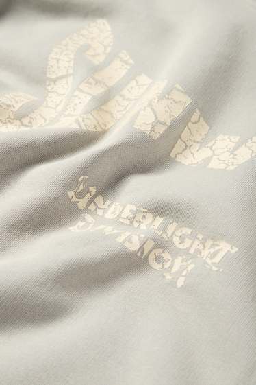 Home - Dessuadora oversized - gris clar