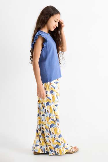 Bambine - Pantaloni di stoffa - effetto brillante - fantasia - giallo