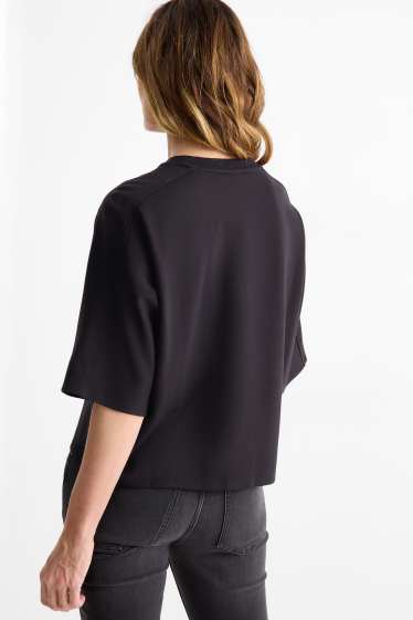 Dona - Dessuadora - oversized - negre