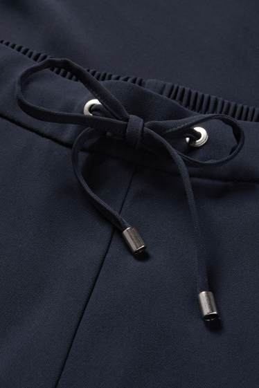 Dámské - Plátěné kalhoty - mid waist - tapered fit - tmavomodrá