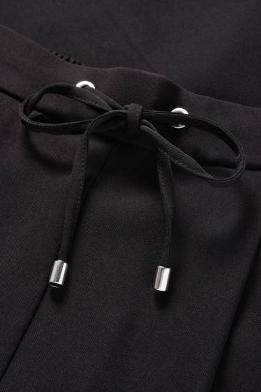 Dámské - Plátěné kalhoty - mid waist - tapered fit - černá