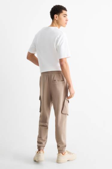 Hommes - Pantalon de jogging cargo - taupe
