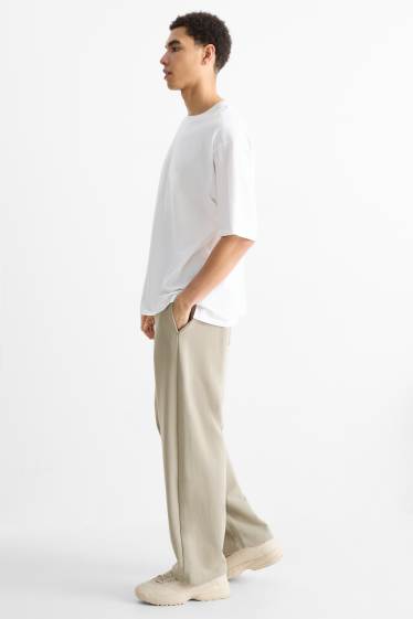 Uomo - Pantaloni sportivi - grigio chiaro