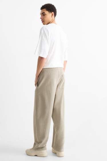 Uomo - Pantaloni sportivi - grigio chiaro