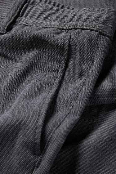 Uomo - Pantaloni chino - tapered fit - tessuto tramato - grigio scuro