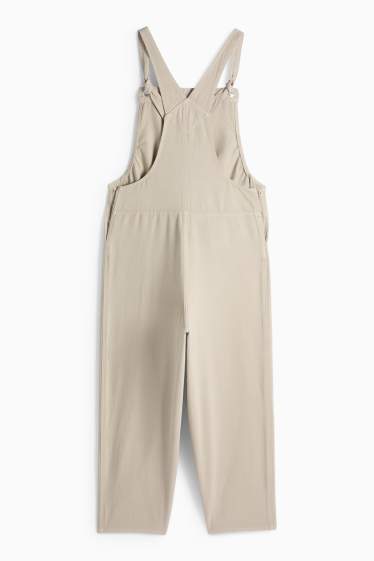 Dámské - Těhotenské džínové kalhoty s laclem - béžová