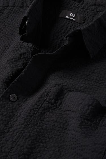 Uomo - Camicia - relaxed fit - collo all'italiana - tessuto tramato - nero
