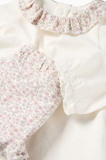 Baby: meisjes - Bloemetjes - babyoutfit - 2-delig - crème wit