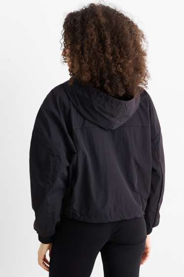 Femmes - Veste à capuche - finition déperlante - noir