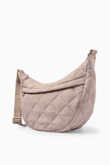 Dona - Bandolera enconxada - beix clar