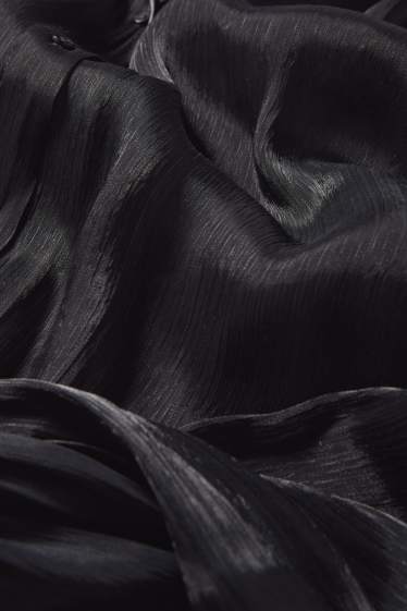 Dames - Blouse met geknoopt detail - glanzend - zwart