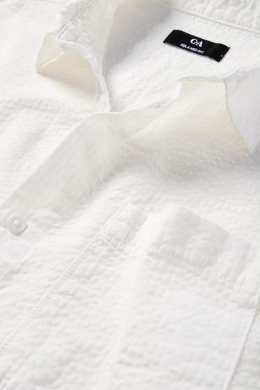 Uomo - Camicia - relaxed fit - collo all'italiana - tessuto tramato - bianco