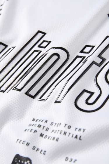 Kinderen: jongens - Sportshirt - wit / zwart