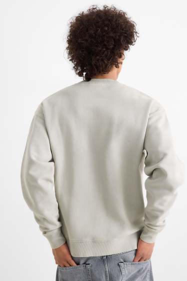 Home - Dessuadora oversized - gris clar