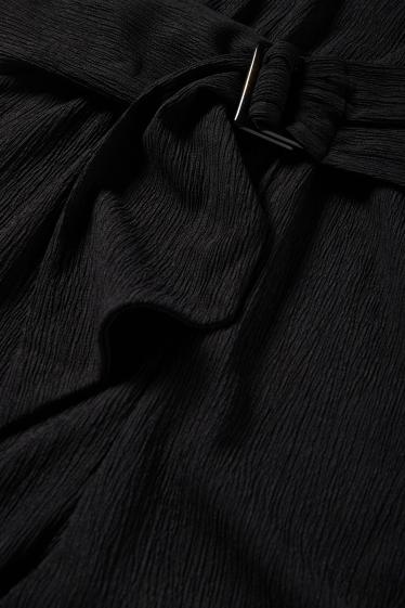 Donna - Tuta con cintura - tessuto tramato - nero