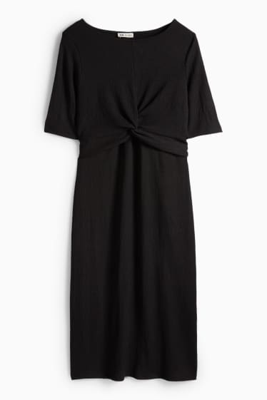 Femmes - Robe de grossesse - finition texturée - noir