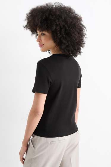 Femmes - T-shirt - relaxed fit - effet brillant - noir