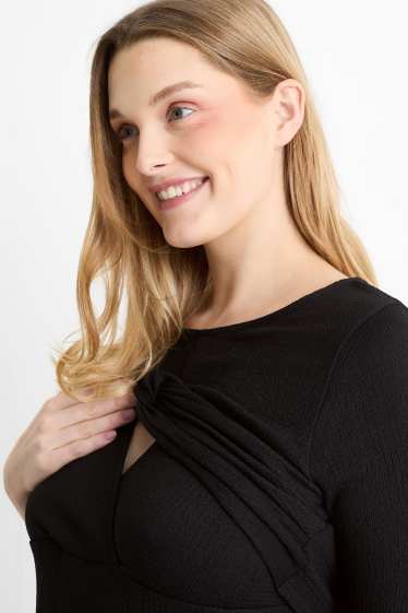 Femmes - Robe de grossesse - finition texturée - noir