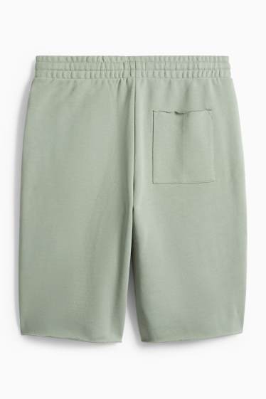Home - Pantalons curts de xandall - verd clar