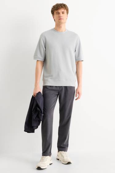 Hommes - Chino - tapered fit - finition texturée - gris foncé