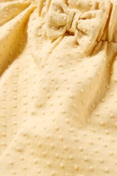 Baby: meisjes - Babyshort - met structuur - geel