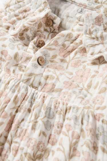 Baby: meisjes - Bloemetje - babyjumpsuit - crème wit