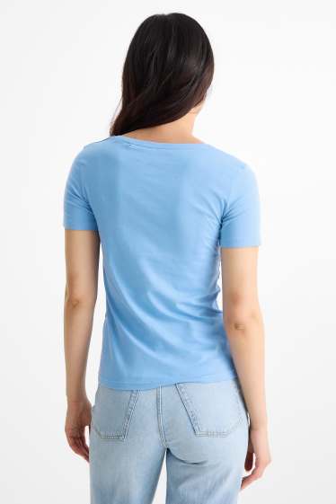 Dames - T-shirt - slim fit - lichtblauw
