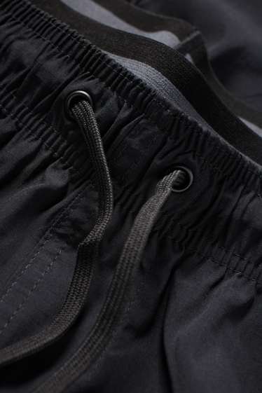 Home - Banyador - look 2 en 1 - negre