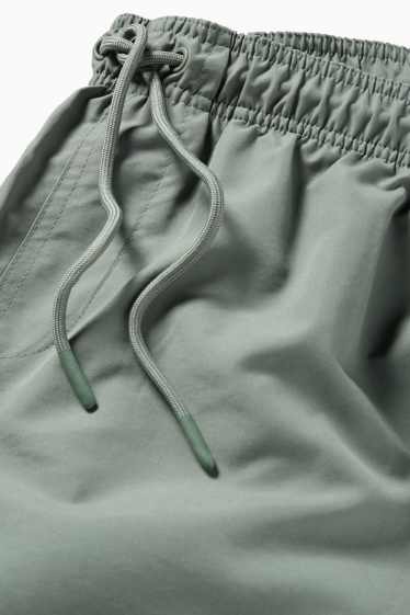 Herren - Badeshorts - grün