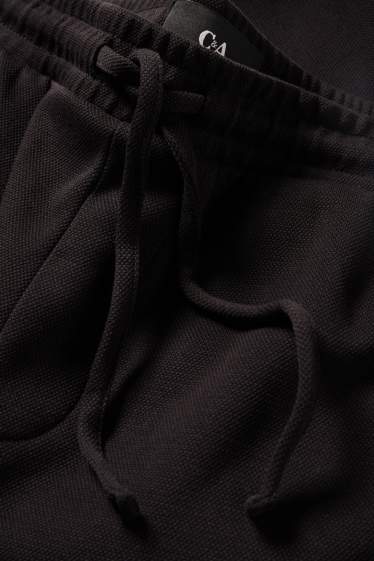 Uomo - Shorts di felpa - tessuto tramato - nero