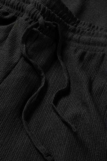 Women - Jersey trousers - mid-rise waist - wide leg - textured - black