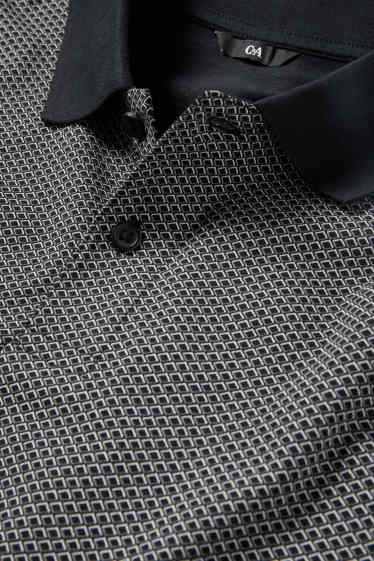 Heren - Poloshirt - regular fit - met patroon - zwart