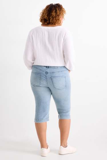 Dámské - Capri džíny - mid waist - slim fit - světle modrá