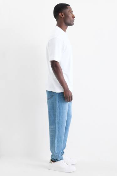 Hommes - Relaxed tapered jean avec teneur en lin - bleu