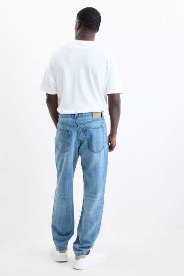 Hommes - Relaxed tapered jean avec teneur en lin - bleu