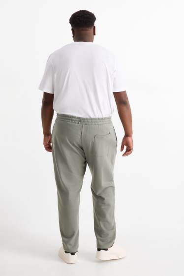 Uomo - Pantaloni sportivi - verde