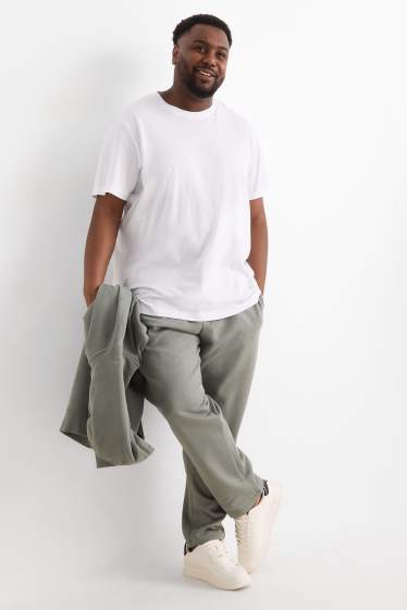 Uomo - Pantaloni sportivi - verde