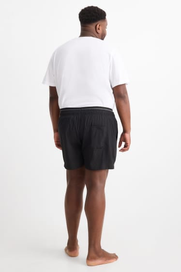 Home - Banyador - look 2 en 1 - negre