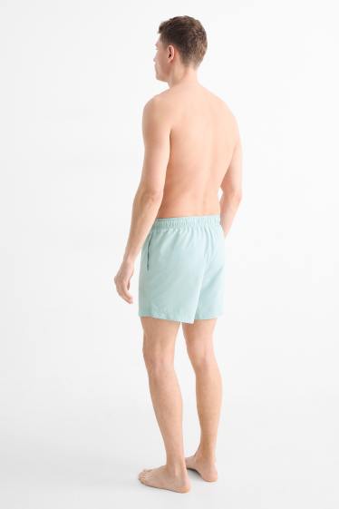 Herren - Badeshorts - helltürkis