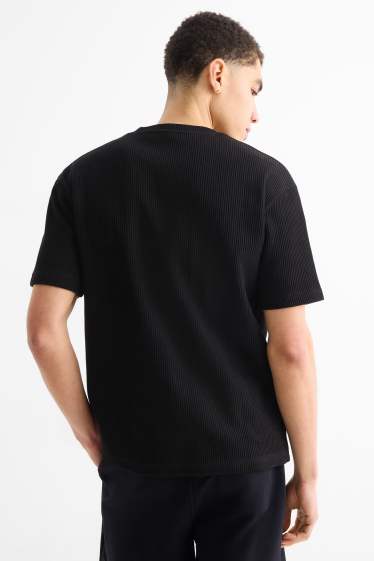 Uomo - T-shirt in maglia - relaxed fit - a coste - nero
