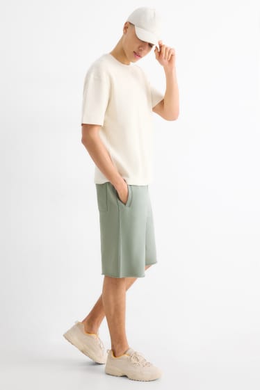 Home - Pantalons curts de xandall - verd clar