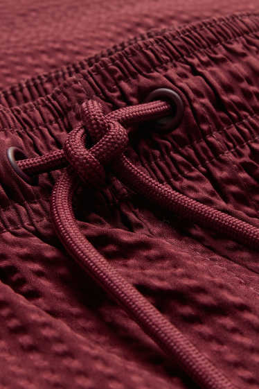 Men - Swim shorts - textured - dark red