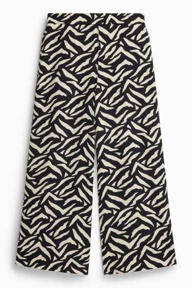 Dona - Pantalons de tela - mid waist - straight fit - estampats - blanc/negre