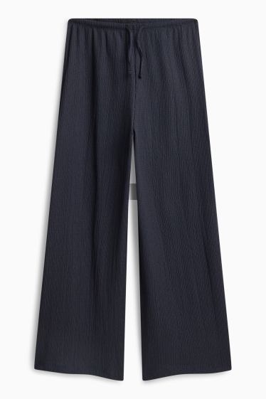 Nena - Pantalons - blau fosc
