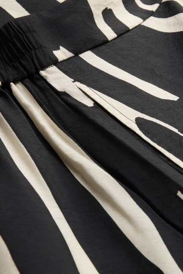 Femei - Pantaloni de stofă - talie înaltă - wide leg - cu model - negru / alb