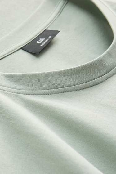 Heren - T-shirt - relaxed fit - lichtgroen