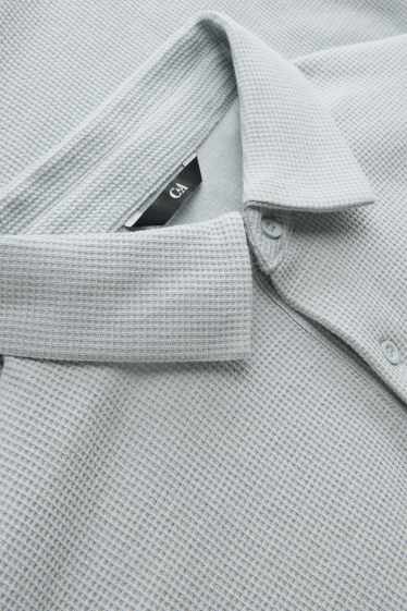 Uomo - Polo - regular fit - tessuto tramato - grigio